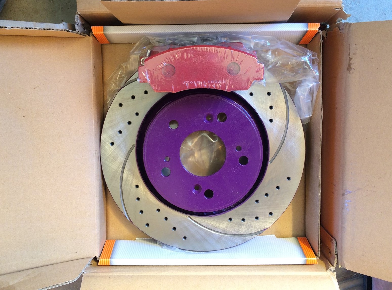 тормозной диск Хонда в упаковке