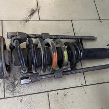 Стяжка пружины для замены