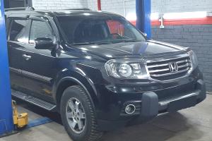 Хонда Пилот в процессе замены подшипника ступицы