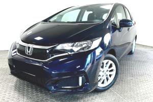 Хонда Джаз в автотехцентре после замены амортизаторов